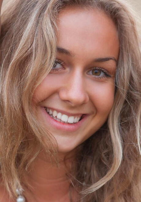 Sylphlike blond young Chiara M bares big boobies and hot butt outdoor